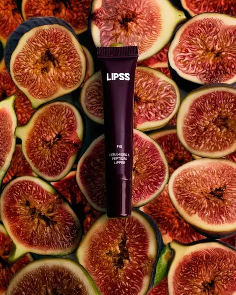 Блиск Lipper Fig від LIPSS на тлі плодів інжиру