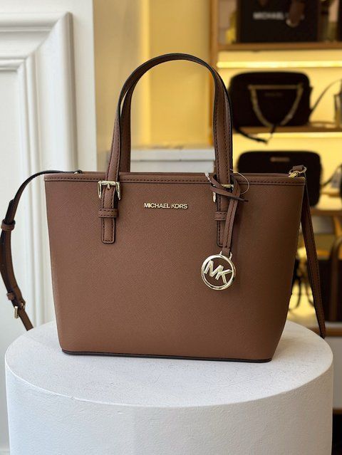 Сумка жіноча Michael Kors Jet Set Travel Extra-Small коричнева шкіряна 	 35T9GTVT0L br фото